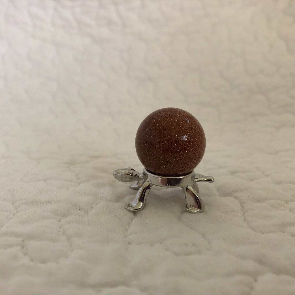 Goldstone 20mm Sphere on Silver Turtle Stand