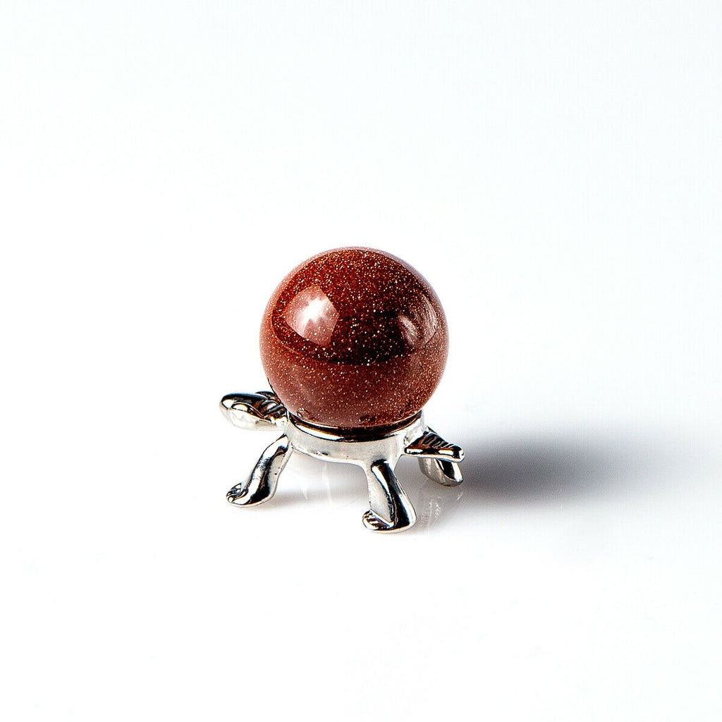 Goldstone 20mm Marble Sphere on a silver turtle stand