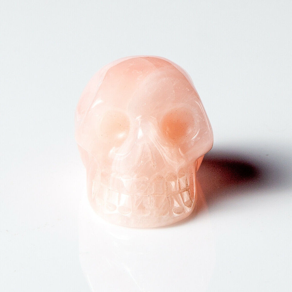 Polished Rose Quartz Hand Carved Gemstone Crystal Skull