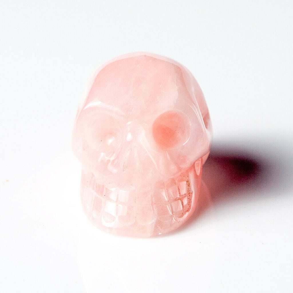 Polished Rose Quartz Hand Carved Gemstone Crystal Skull