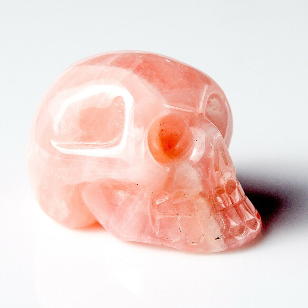 Polished Rose Quartz Hand Carved Gemstone Crystal Skull