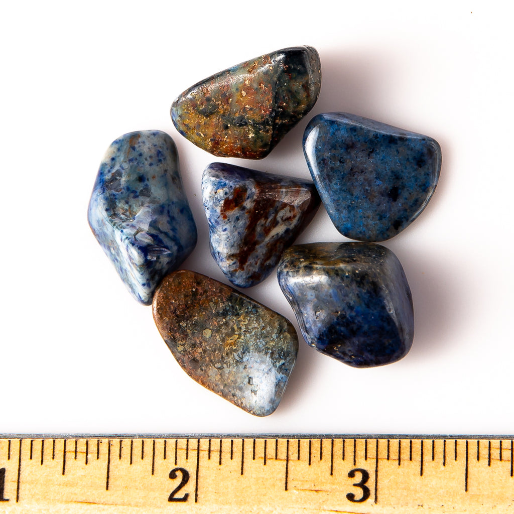 Medium Tumbled Dumortierite Gemstones with a Ruler for Size