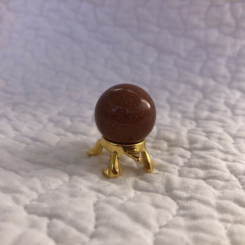 Goldstone 20mm Sphere on Gold Turtle Stand