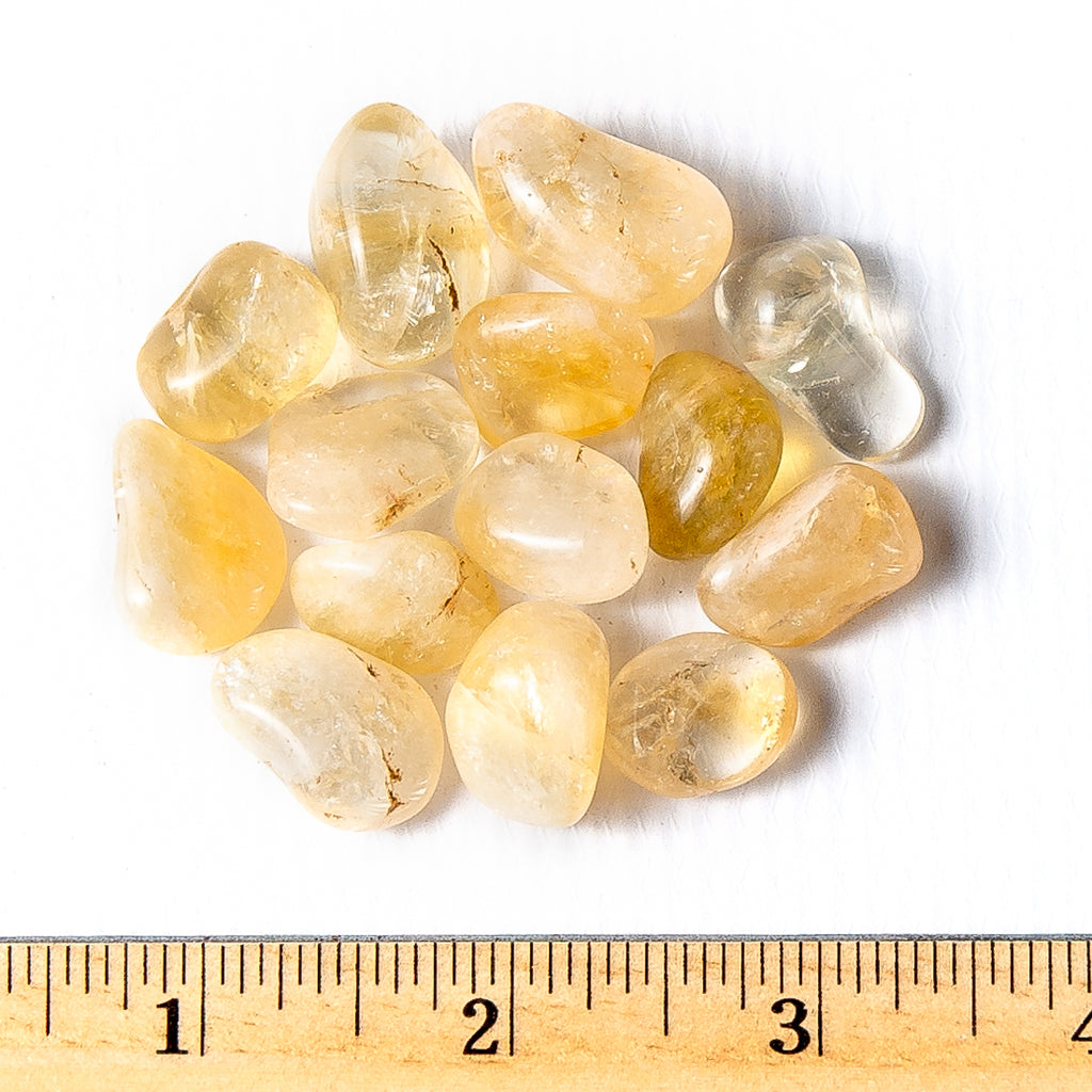 Small Tumbled Citrine Quartz Gemstones with a Ruler for Size
