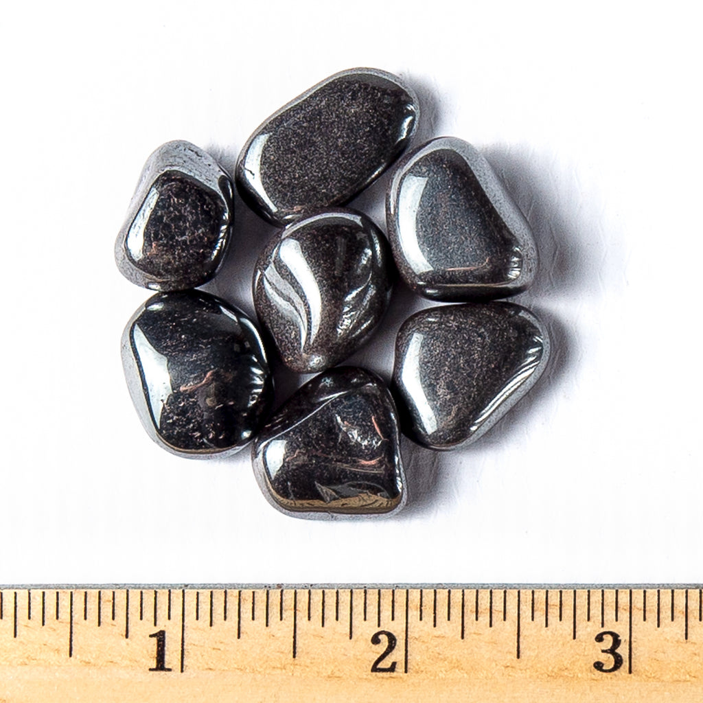 Small Tumbled Hematite Gemstones with a Ruler for Size