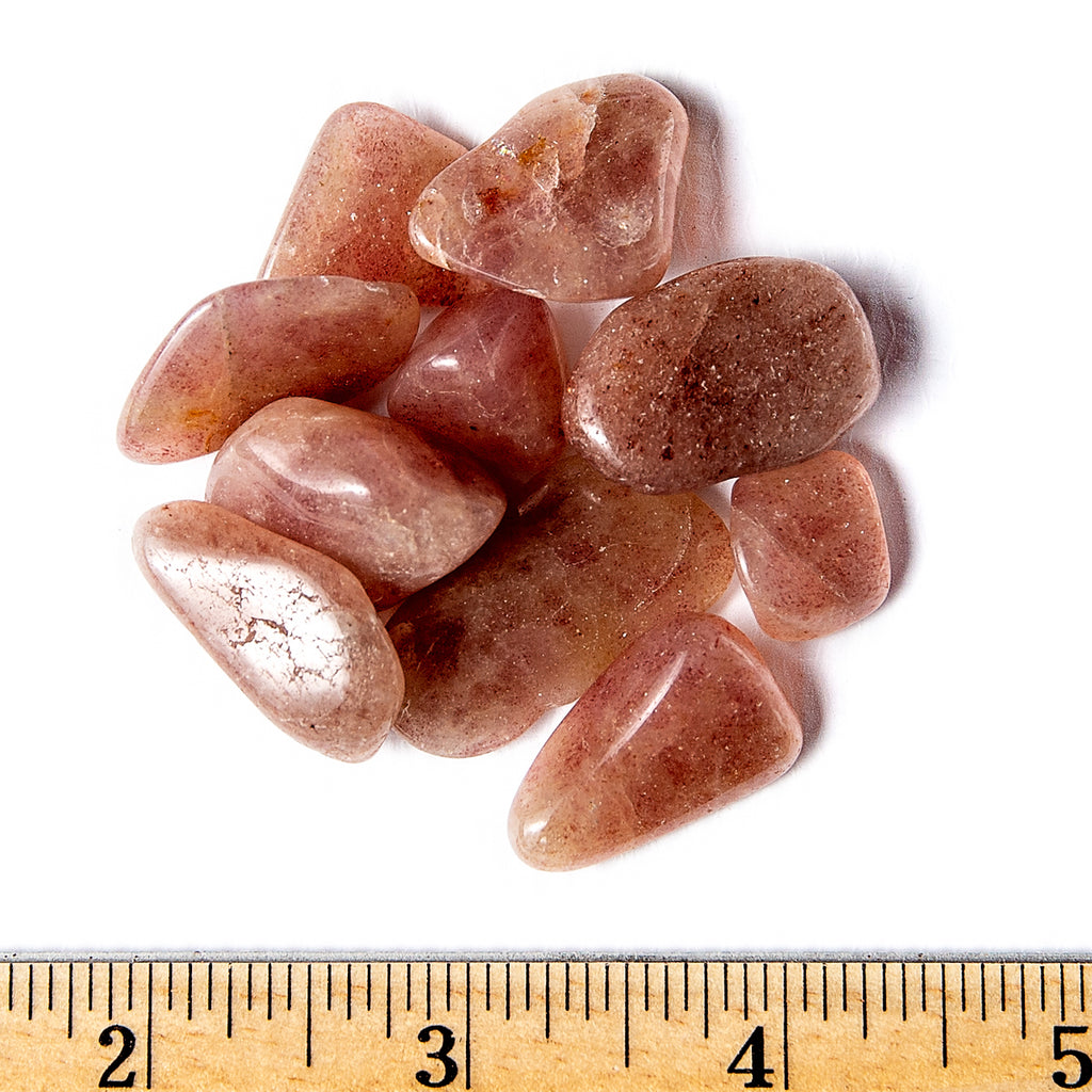 Small Tumbled Red Aventurine Gemstones with a Ruler for Size